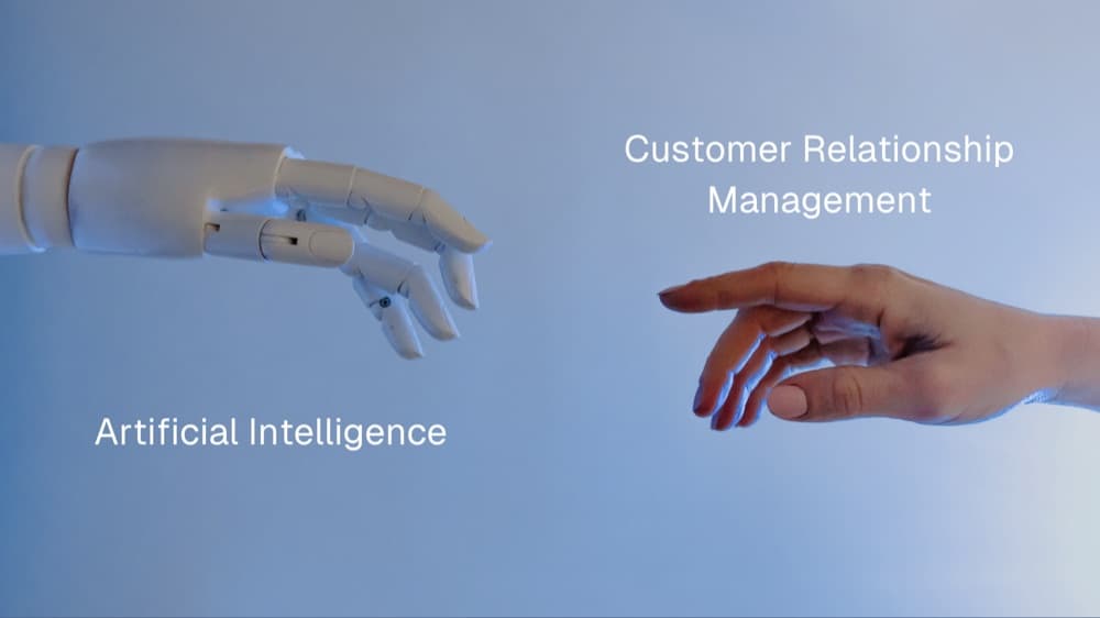 Robot hand and human hand reaching toward each other, labeled Artificial Intelligence and Customer Relationship Management
