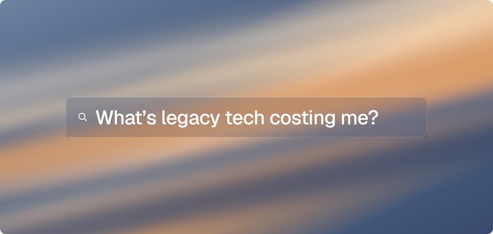 "What’s legacy tech costing me?" search bar over a frosted sunset blur