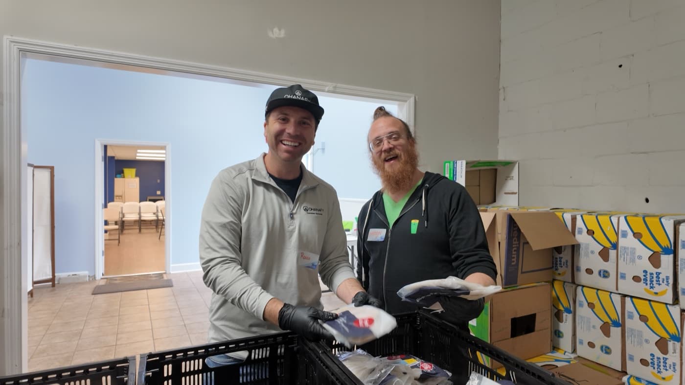 Team members sorting donations at the food bank